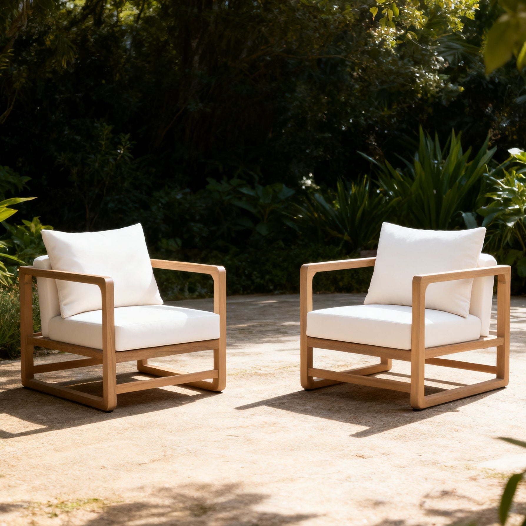 Outdoor club chairs with white cushions and natural wood frames by HouseOfZazla on Tampa Home & Garden Store