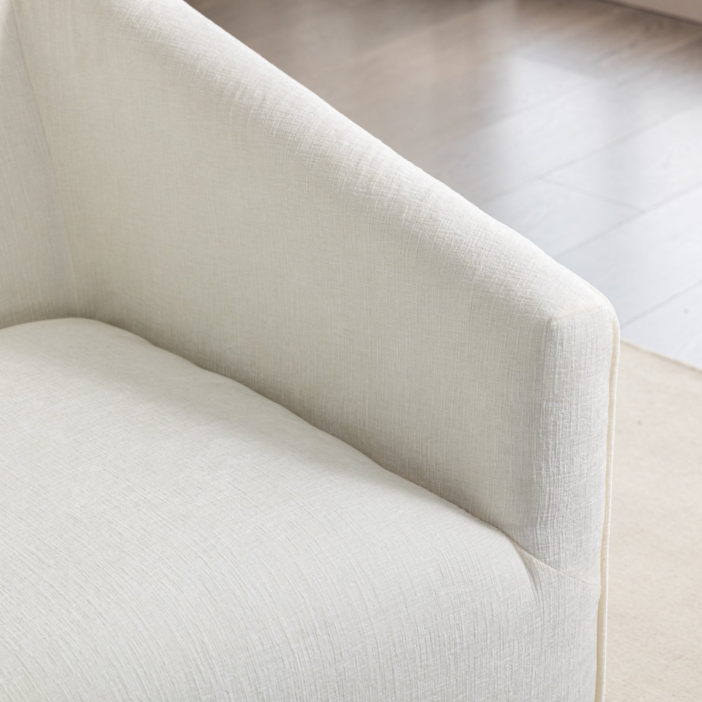 Nice Modern Upholstered Barrel Armchair beige linen fabric, curved arm close-up on Tampa Home & Garden Store