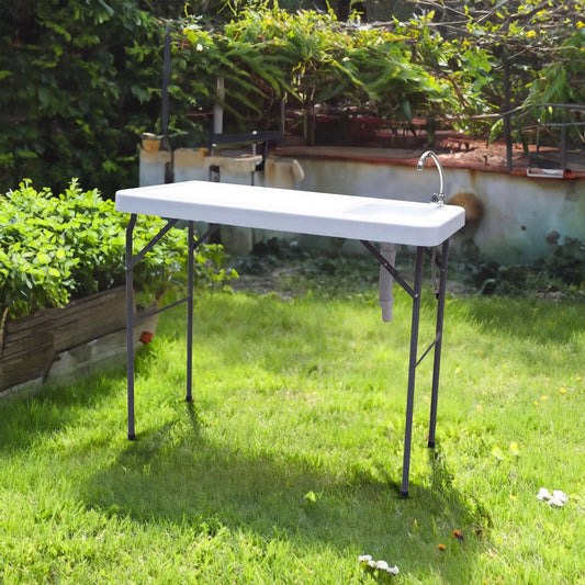 Outdoor Fish and Game Cutting Table With Sink, white plastic top, folding metal legs on Tampa Home & Garden Store
