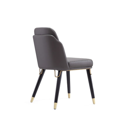 Estelle Dining Chair with Metal Accents dark gray upholstery, black legs with gold tips on Tampa Home & Garden Store