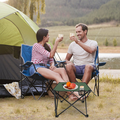 Foldable camping table with green top, 2 cup holders, portable picnic desk at campsite on Tampa Home & Garden Store