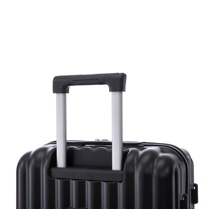 Black hard-shell carry-on suitcase with aluminum telescoping handle on Tampa Home & Garden Store