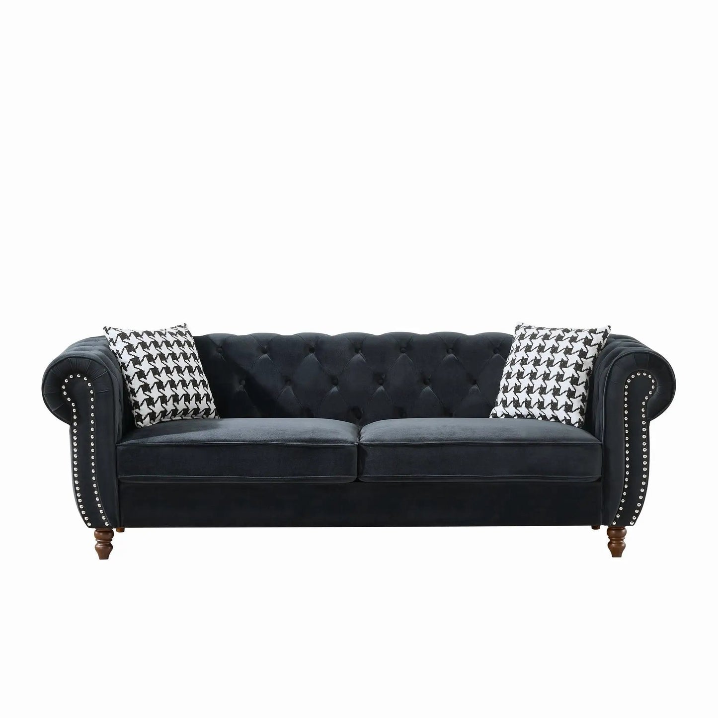 Chesterfield sofa with roll arms and nailhead trim in black fabric, 2 houndstooth pillows on Tampa Home & Garden Store