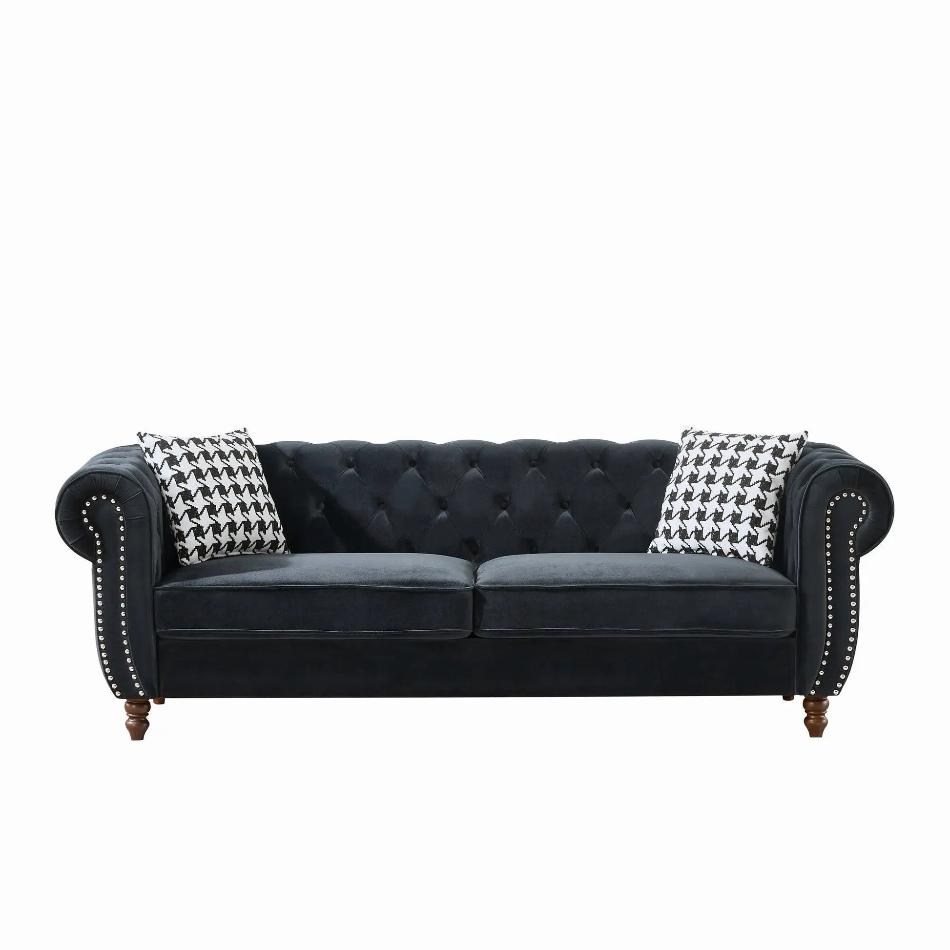 Chesterfield sofa with roll arms and nailhead trim in black fabric, 2 houndstooth pillows on Tampa Home & Garden Store