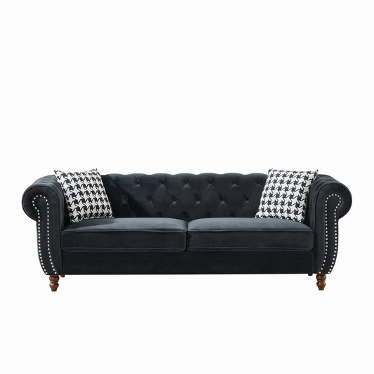 Chesterfield fabric sofa with roll arms and nailhead trim in navy, 2 houndstooth pillows on Tampa Home & Garden Store