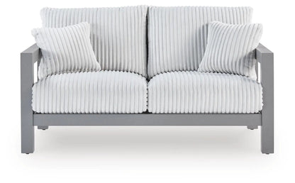 Hurley Park Loveseat with Cushions, gray metal frame and ribbed white cushions on Tampa Home & Garden Store