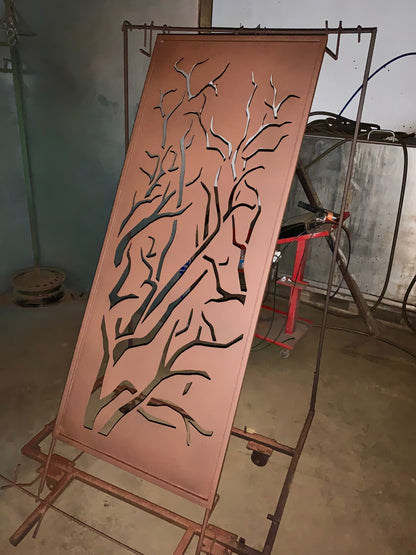 Outdoor metal privacy panel with tree-cutout design in pink finish on Tampa Home & Garden Store