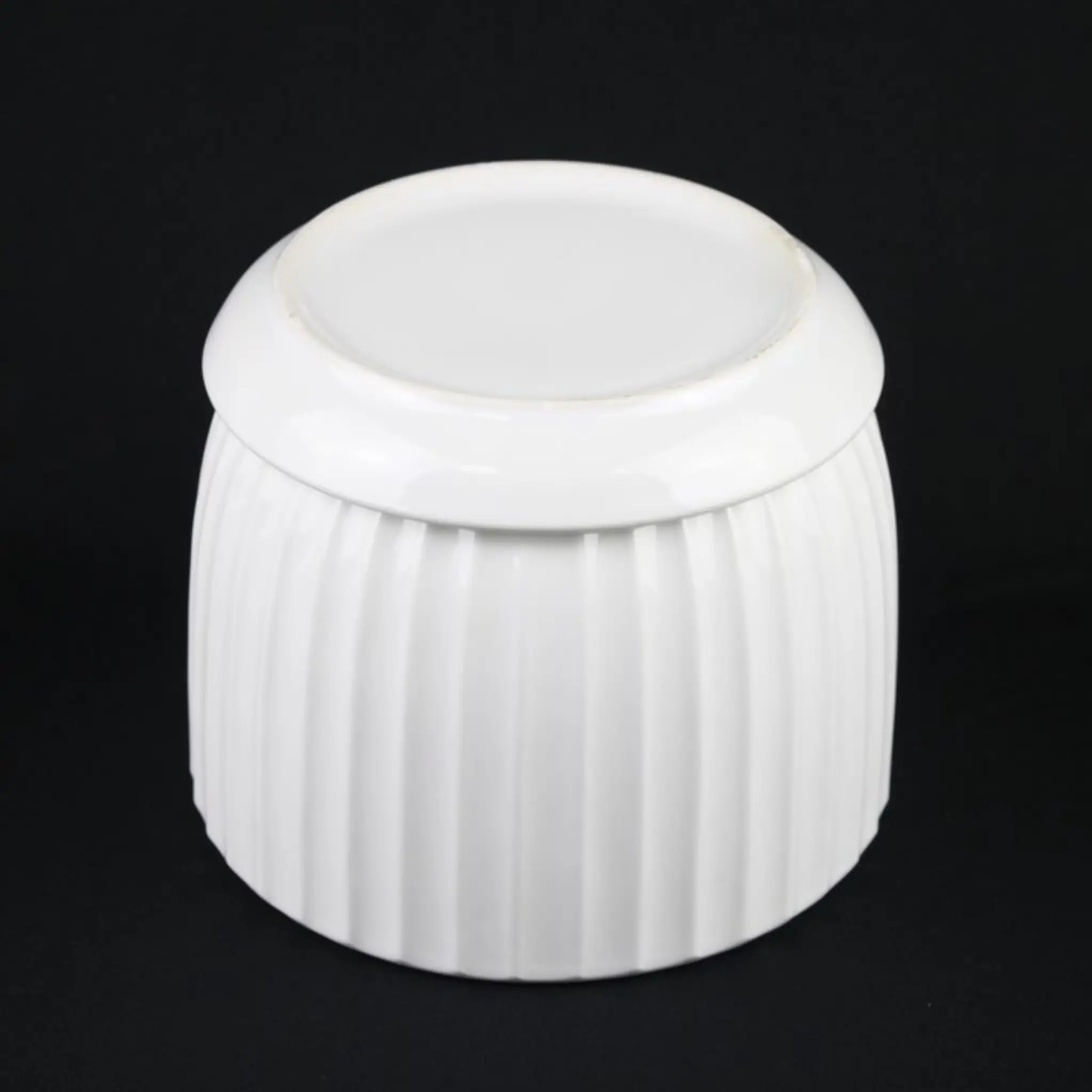White ceramic planter with vertical fluted texture and matching saucer on Tampa Home & Garden Store