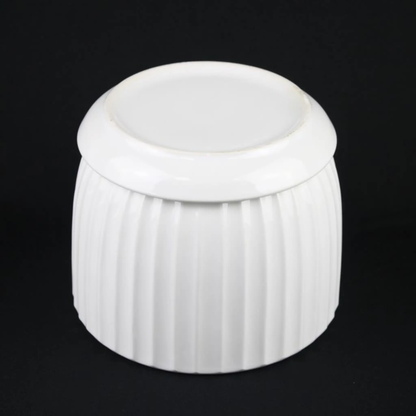 White ceramic planter with vertical fluted texture and matching saucer on Tampa Home & Garden Store