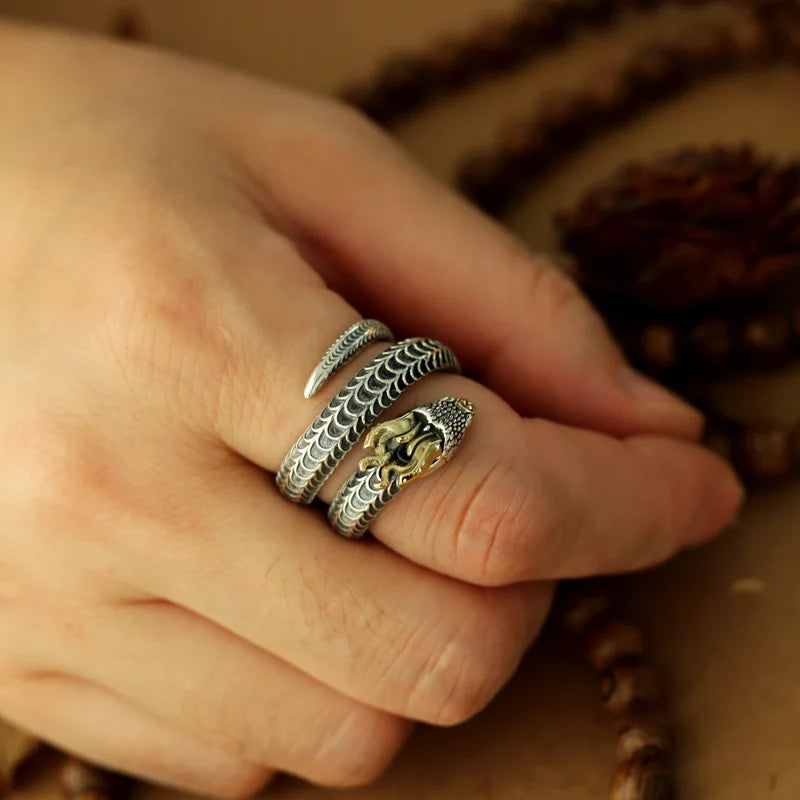 Draco Coil Ring trio with silver snake-scale bands and gold serpent head by BikerZoneZ on Tampa Home & Garden Store