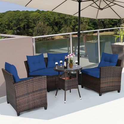 Oval coffee table with brown wicker base and glass top DirectDeals outdoor furniture on Tampa Home & Garden Store