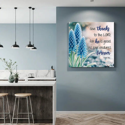 Psalm 136:1 Faith Wall Sign canvas by Tailored Canvases featuring blue hyacinths on Tampa Home & Garden Store