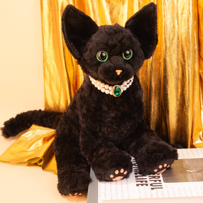 Devon Rex Cat Plush by Chongker, black fluffy stuffed animal with green eyes and pearl necklace on Tampa Home & Garden Store