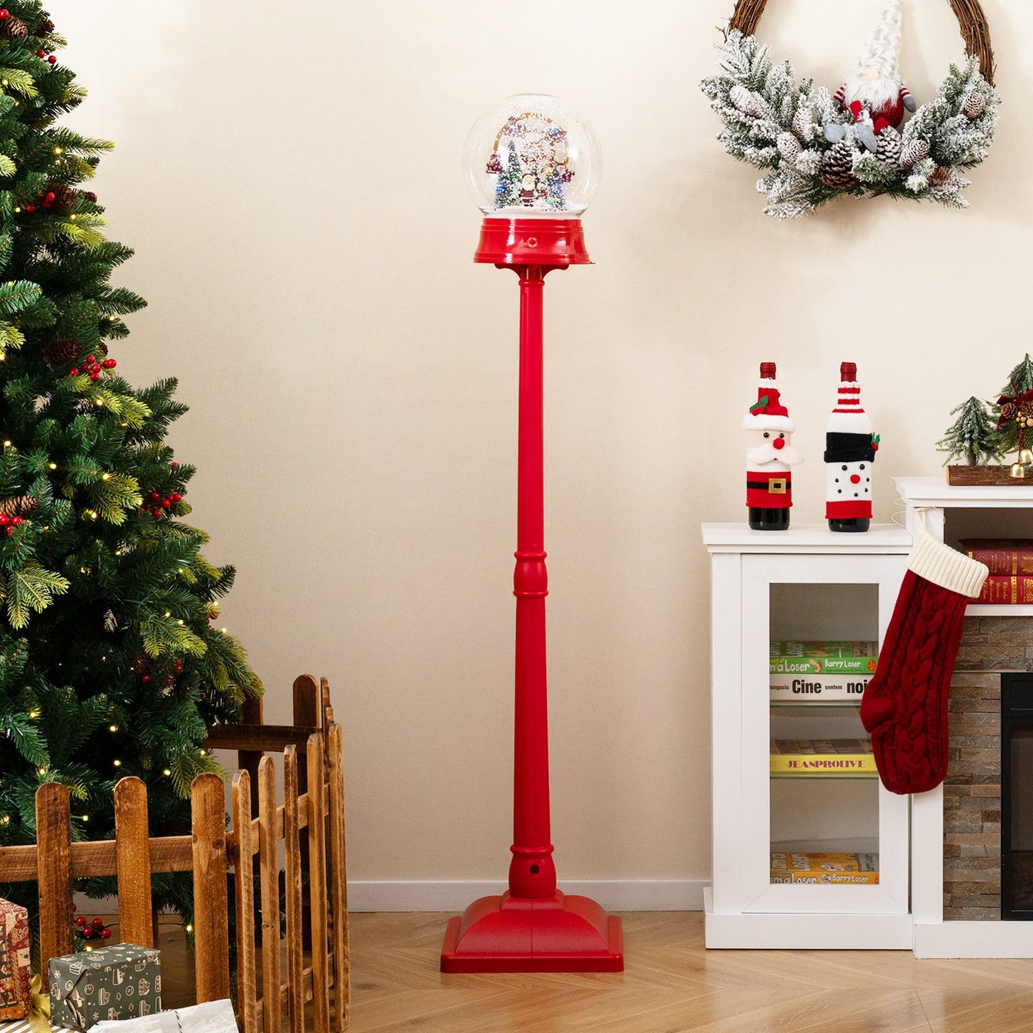 Red 5 ft musical Christmas street lamp snow globe lantern on stand with festive scene inside globe on Tampa Home & Garden Store