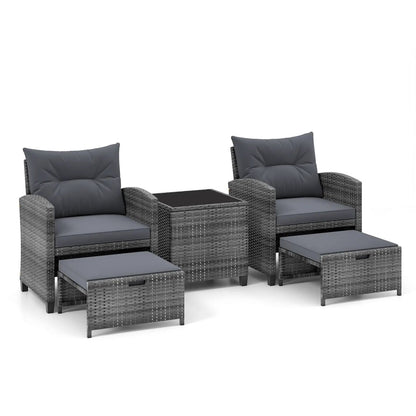 Patio Rattan Set with Ottomans and Glass Table