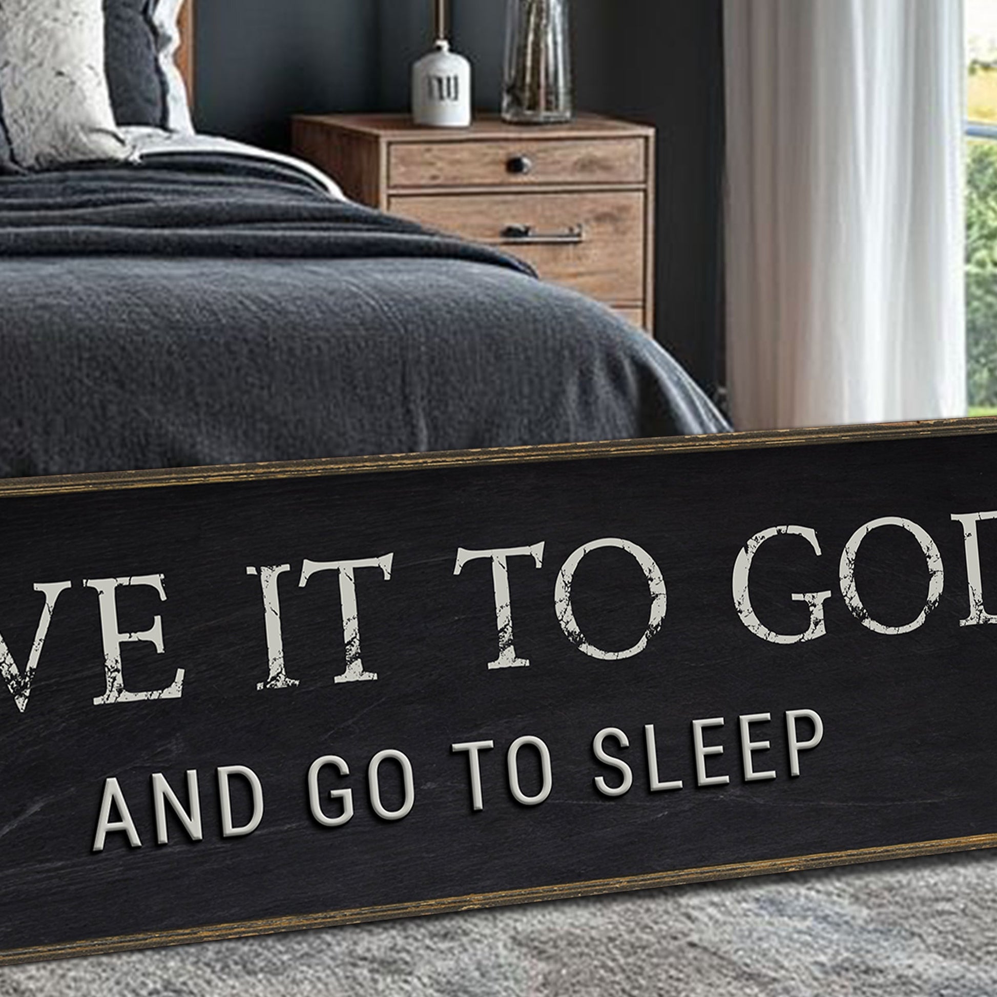 Give It To God And Go To Sleep canvas sign with distressed white lettering on black on Tampa Home & Garden Store
