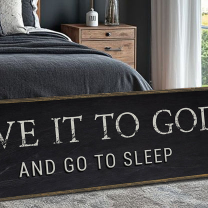 Give It To God And Go To Sleep canvas sign with distressed white lettering on black on Tampa Home & Garden Store