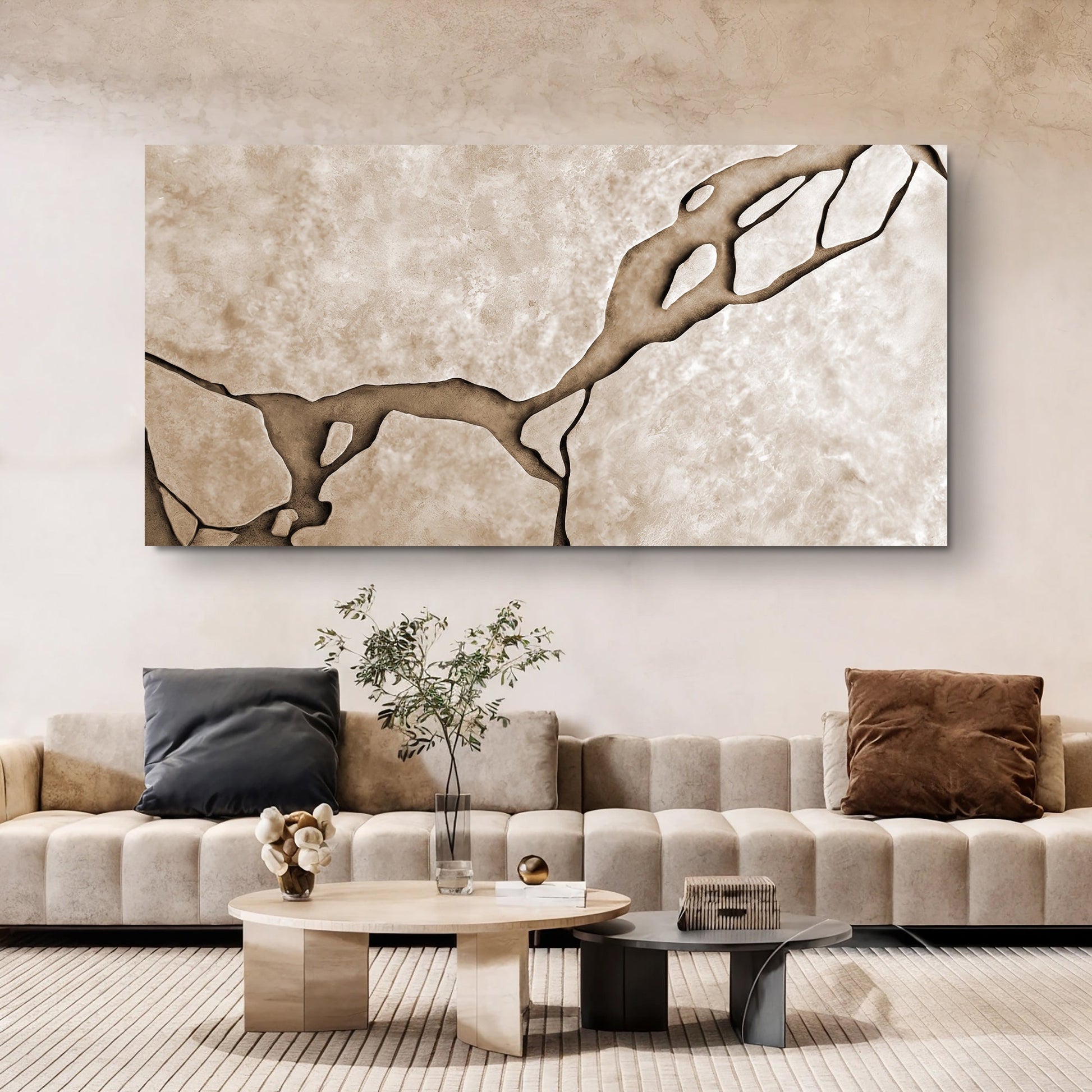 Muddy Abstract Wall Art canvas by Tailored Canvases in sepia tones with branch above beige sofa on Tampa Home & Garden Store