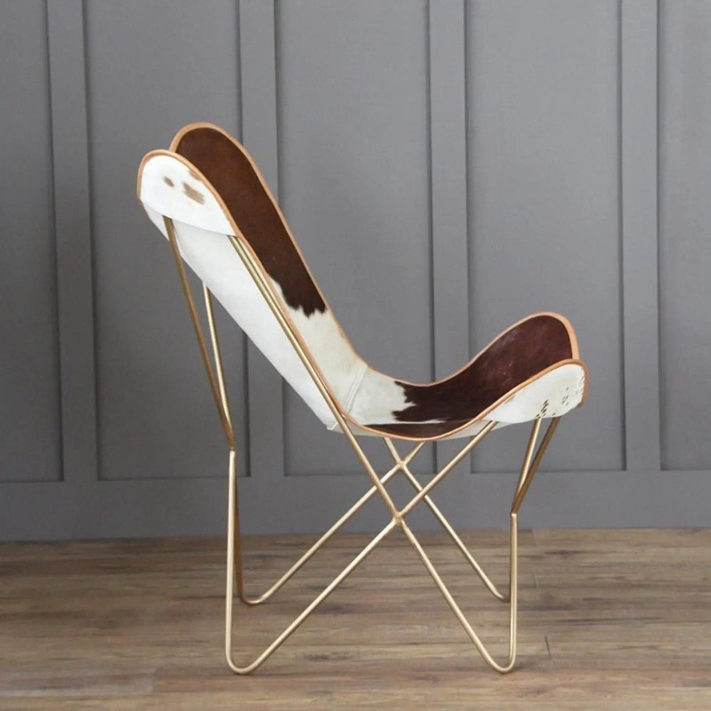 The Swiss Butterfly Chair Classy Leather Bags, white cowhide seat with brown patches on Tampa Home & Garden Store