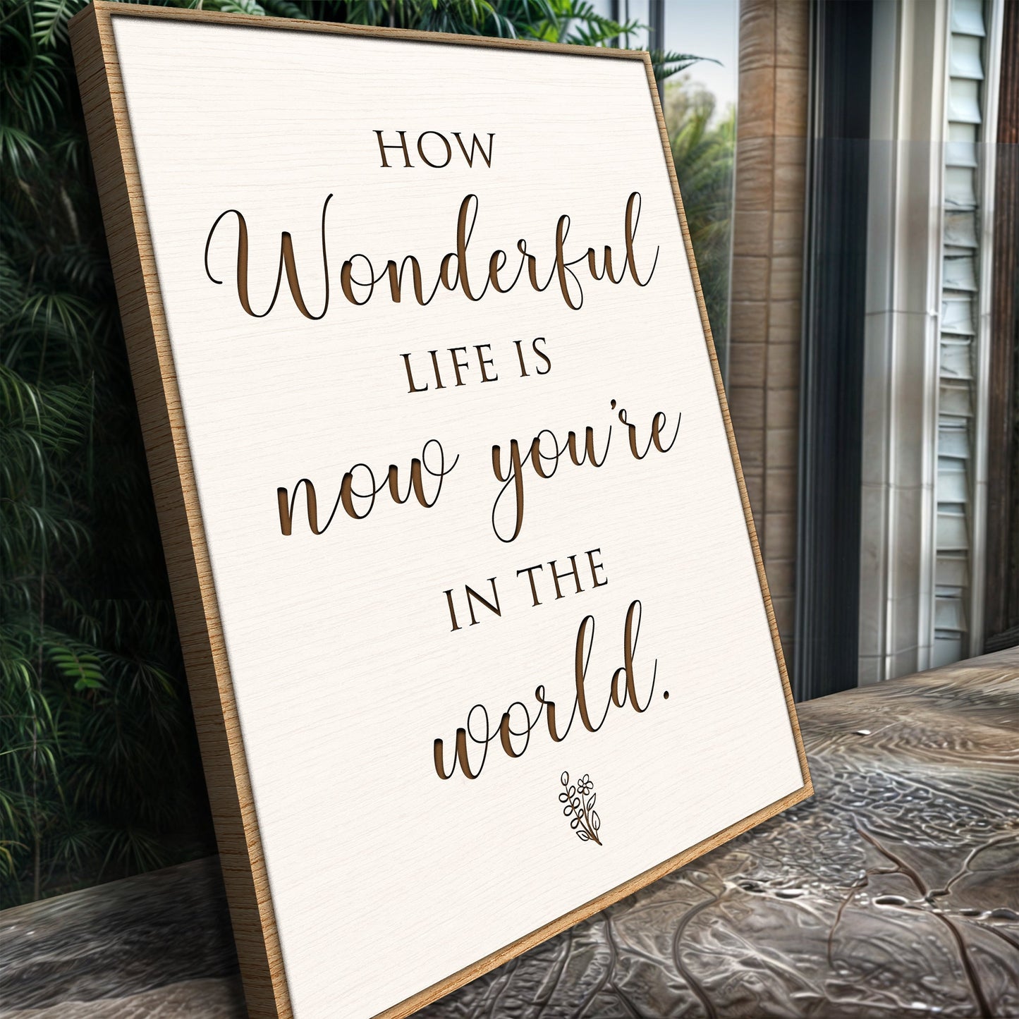 How Wonderful Life Is Nursery Sign II canvas with light wood frame displayed outdoors on Tampa Home & Garden Store