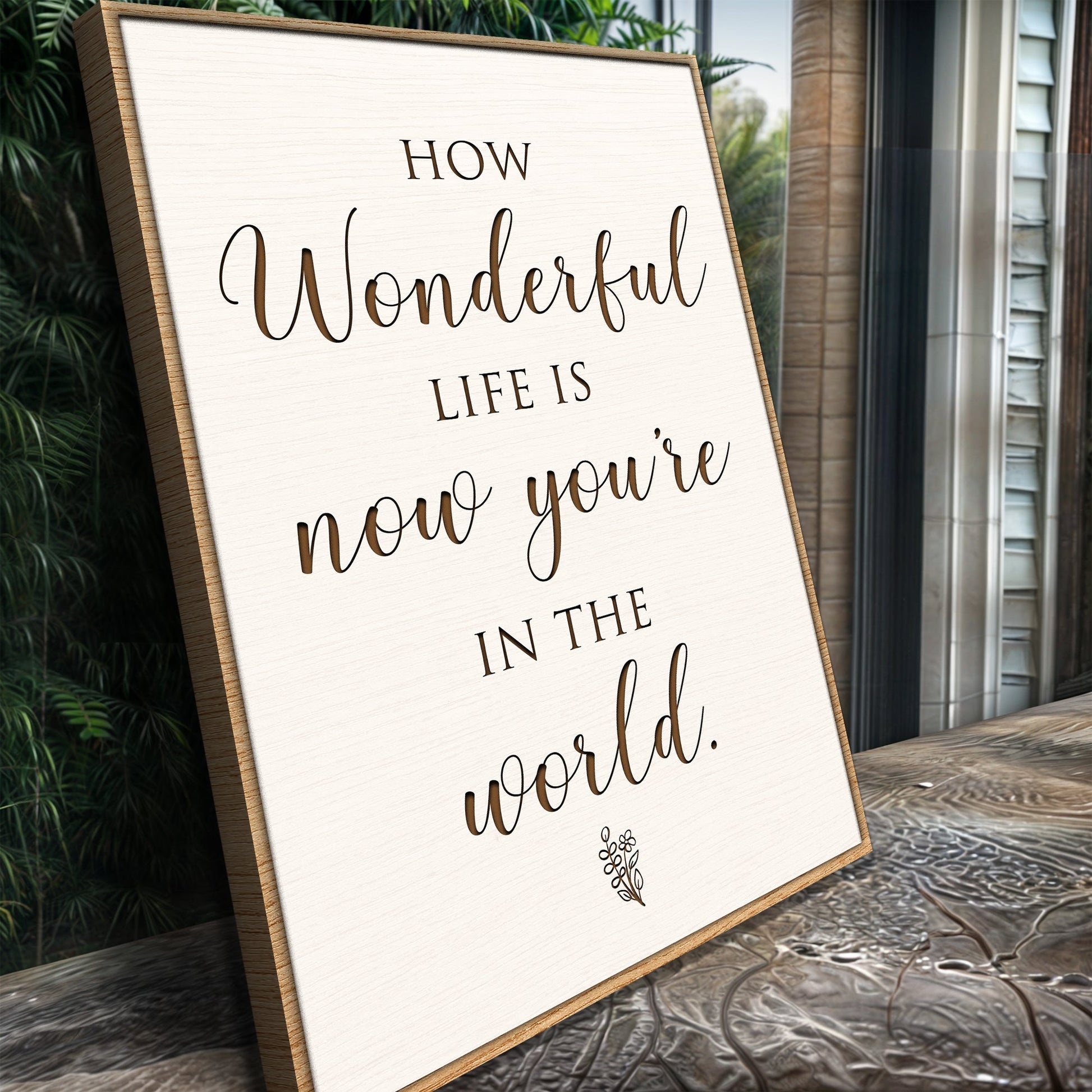 How Wonderful Life Is Nursery Sign II canvas with light wood frame displayed outdoors on Tampa Home & Garden Store