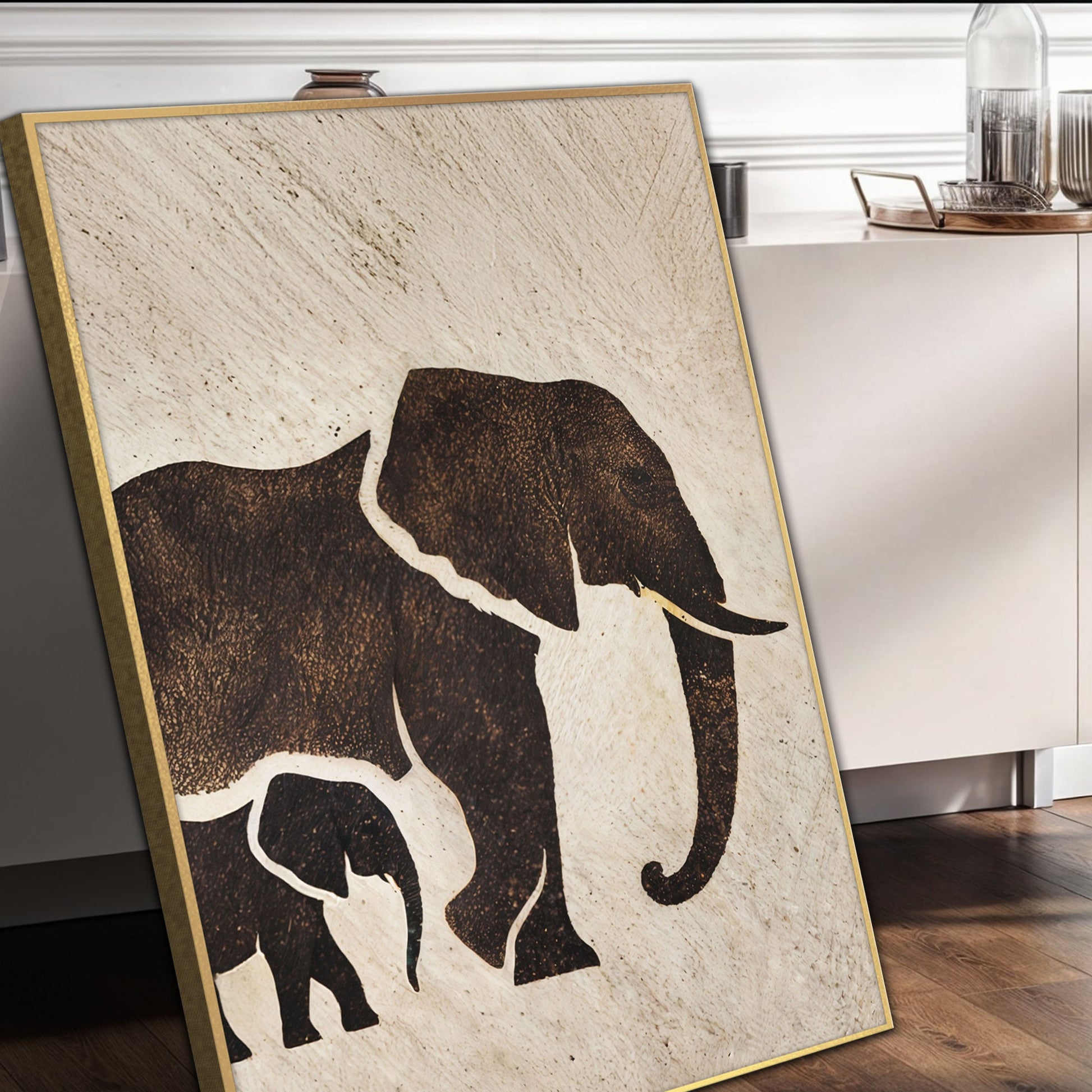 Elephant Heritage Wall Art canvas with dark silhouette on beige background and gold frame on Tampa Home & Garden Store