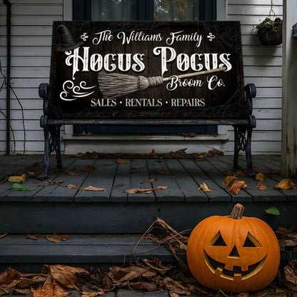 Canvas wall sign Hocus Pocus Broom Co. motif on dark wood with script Tailored Canvases on Tampa Home & Garden Store