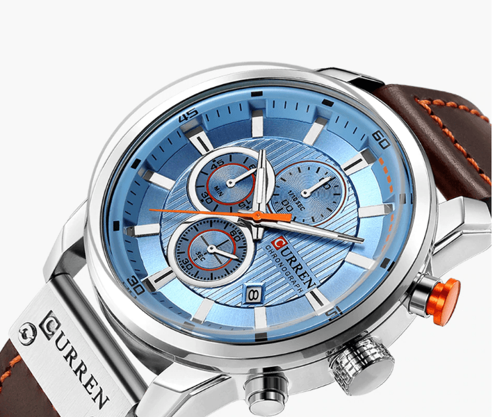Men's Curren chronograph watch with blue dial, brown leather strap, day/date display on Tampa Home & Garden Store