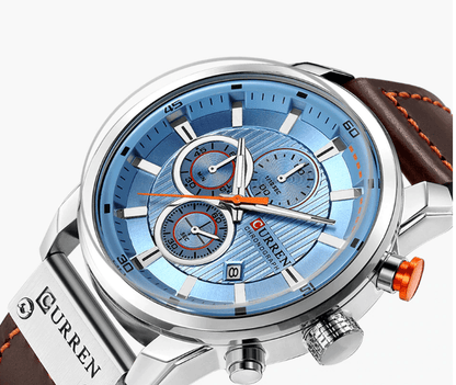 Men's Curren chronograph watch with blue dial, brown leather strap, day/date display on Tampa Home & Garden Store