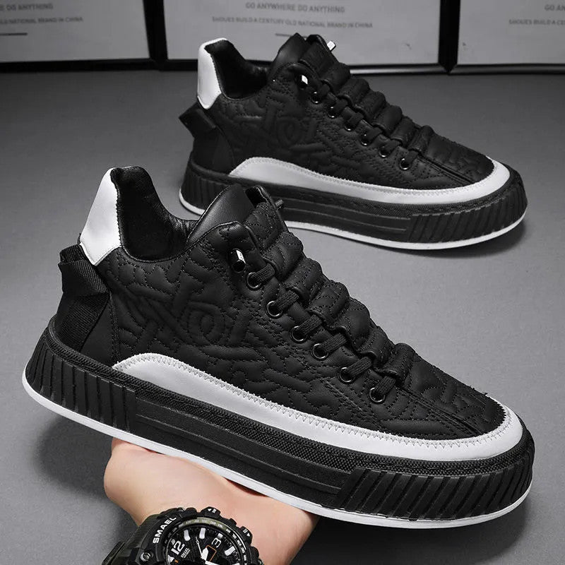 Stevvex men's black quilted sneakers pair with thick platform sole, white accents, lace-up on Tampa Home & Garden Store
