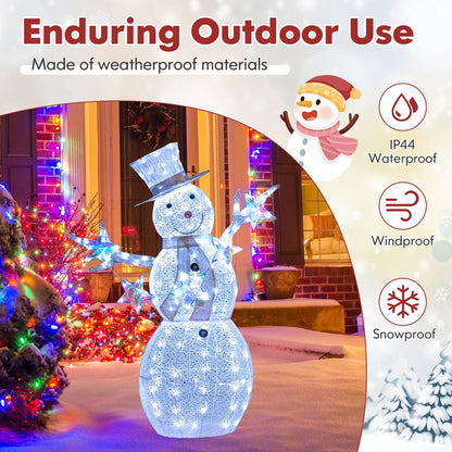 5 ft Pre-Lit Christmas Snowman with Stars, illuminated snow globe with blue lights in snowy yard on Tampa Home & Garden Store