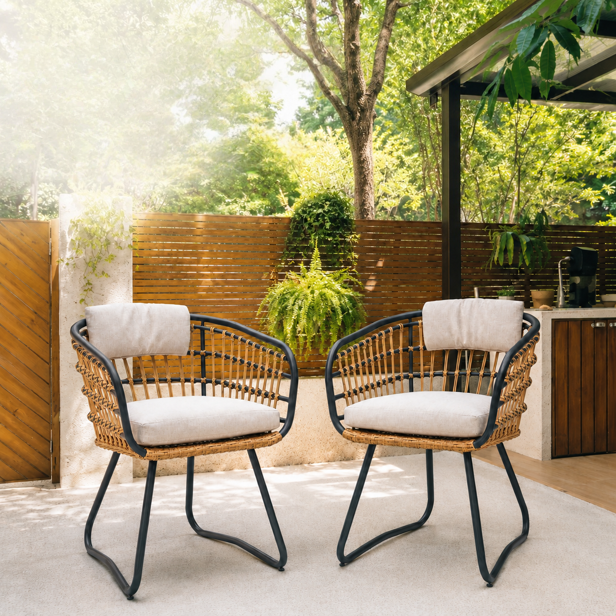 Outdoor wicker dining chairs set of 2 with beige cushions and black metal frames on Tampa Home & Garden Store