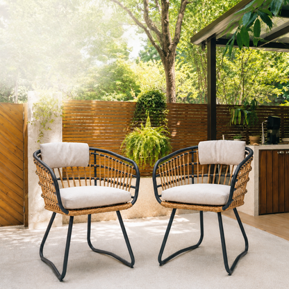 Outdoor wicker dining chairs set of 2 with beige cushions and black metal frames on Tampa Home & Garden Store