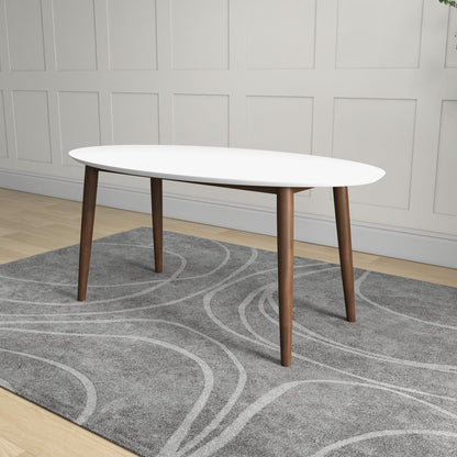 White mid-century oval dining table with solid wood top and brown legs on Tampa Home & Garden Store