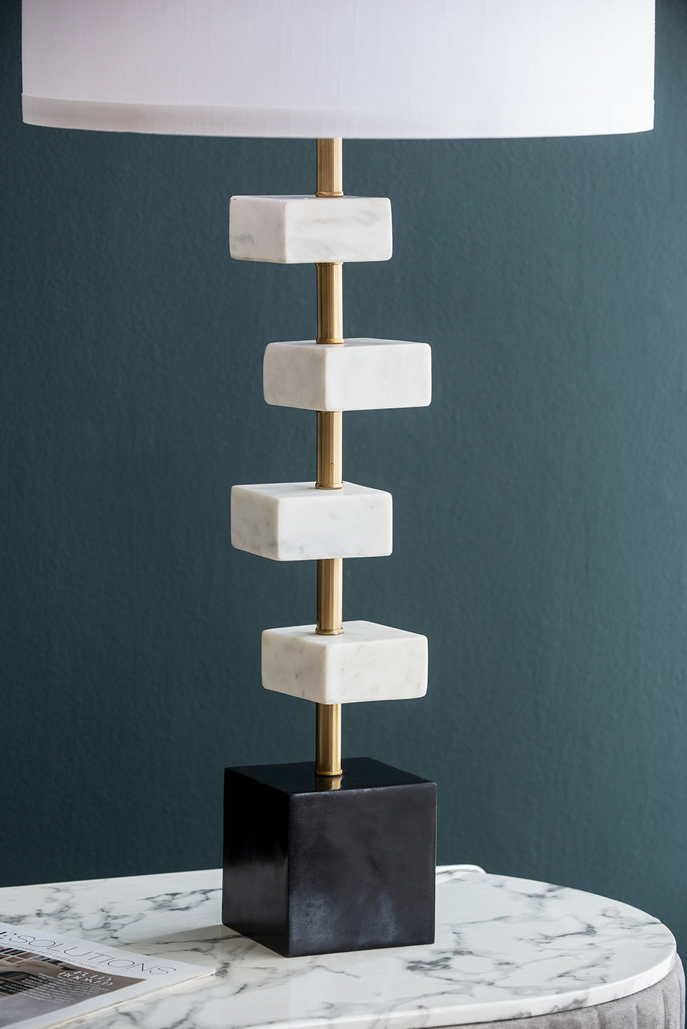Table lamp D15x30 with white marble blocks on brass stem, black cube base, white shade on Tampa Home & Garden Store