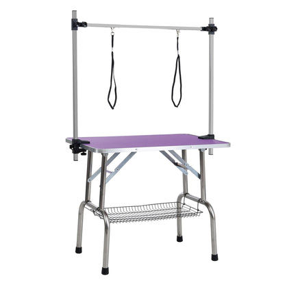 Folding pet grooming table with stainless steel frame and rubber mat on board, two arm clamps on Tampa Home & Garden Store