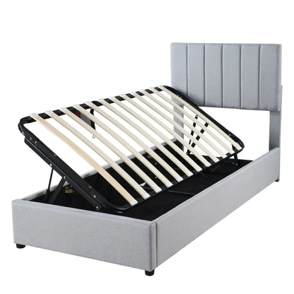 Upholstered platform bed with hydraulic storage, gray headboard, black metal frame on Tampa Home & Garden Store