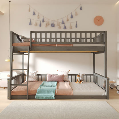 Bunk bed with ladder and guardrails in dark gray wood with peach bedding on Tampa Home & Garden Store