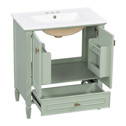 Freestanding vanity in pale green with white top, built-in sink, soft-close doors and drawers on Tampa Home & Garden Store