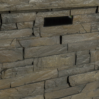 33in square MGO fire pit inset into a textured gray stacked-stone wall on Tampa Home & Garden Store