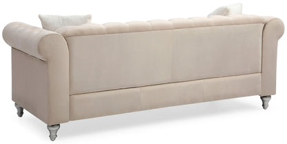 the Raisa Tufted Sofa and Nailhead Accents