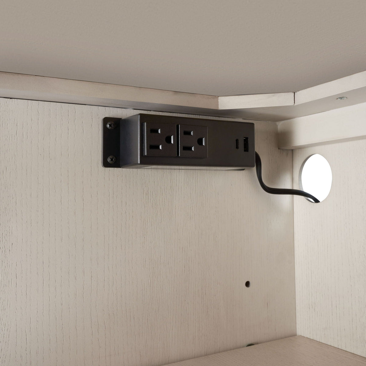 White server with base power access shows a black 2-outlet strip under a shelf with a cord on Tampa Home & Garden Store