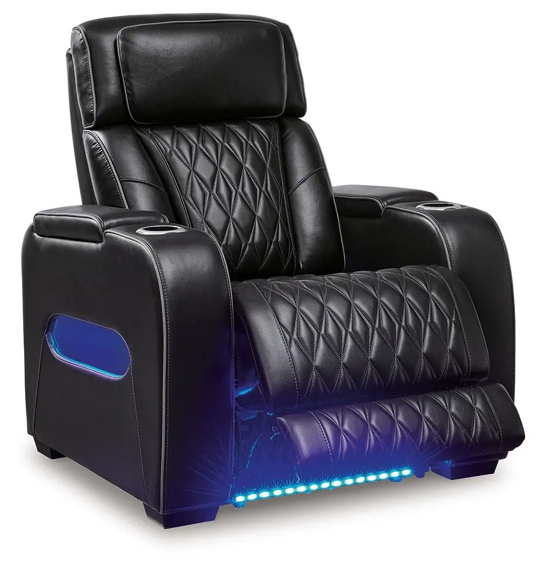 Boyington power recliner with adj headrest in black leather, diamond stitching, cupholders on Tampa Home & Garden Store