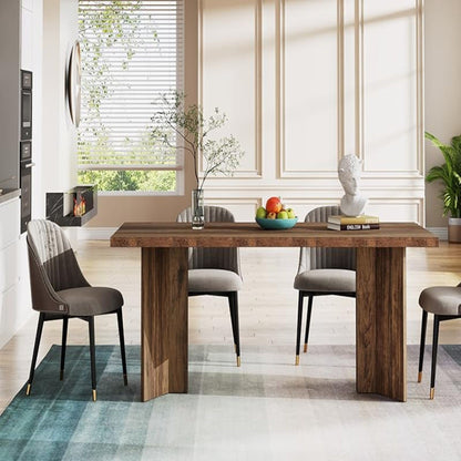 Dining table for 4-6 with a thick wood top in warm brown with gray upholstered chairs on Tampa Home & Garden Store