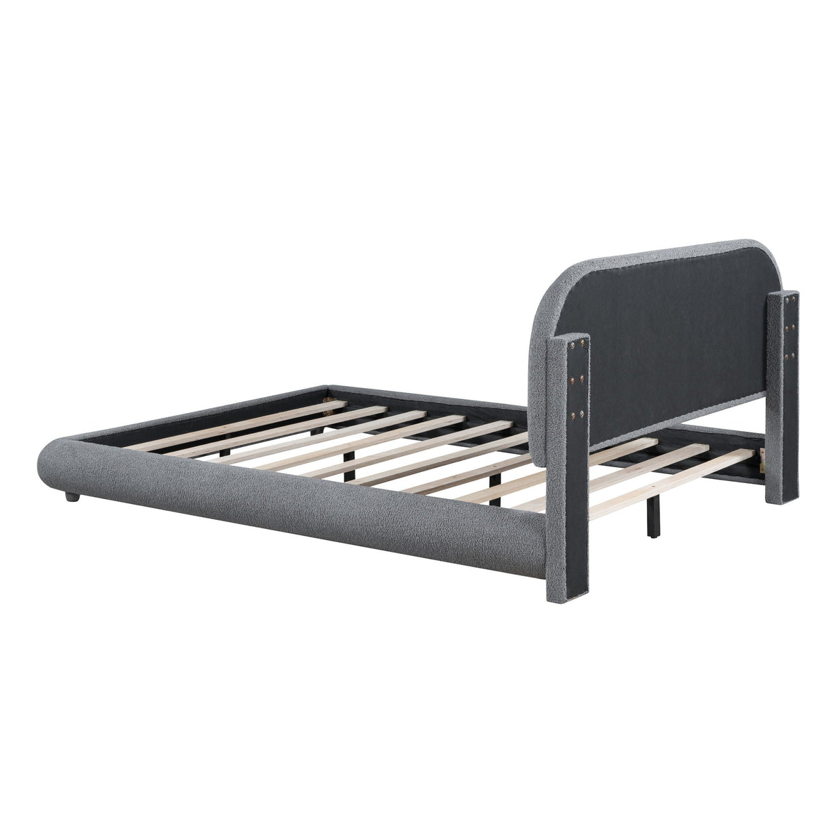Upholstered platform bed with thick grey frame and curve-shaped headboard by HouseOfZazla on Tampa Home & Garden Store