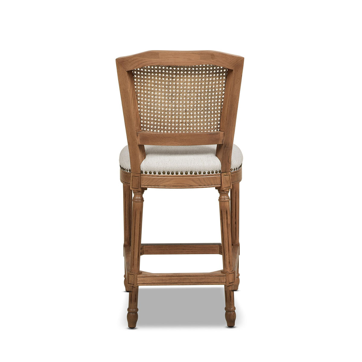 Rattan wicker high-back counter stool with oak frame and beige upholstered seat caned back on Tampa Home & Garden Store