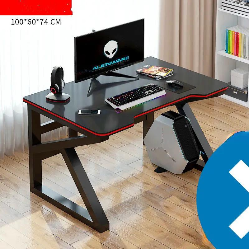 Gaming desk with black top, red edge trim, angled legs, RGB keyboard, monitor, and PC tower on Tampa Home & Garden Store