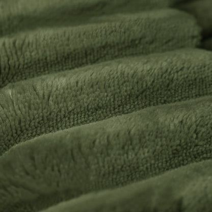 Green plush corduroy ottoman fabric close-up with textured ridges on Tampa Home & Garden Store