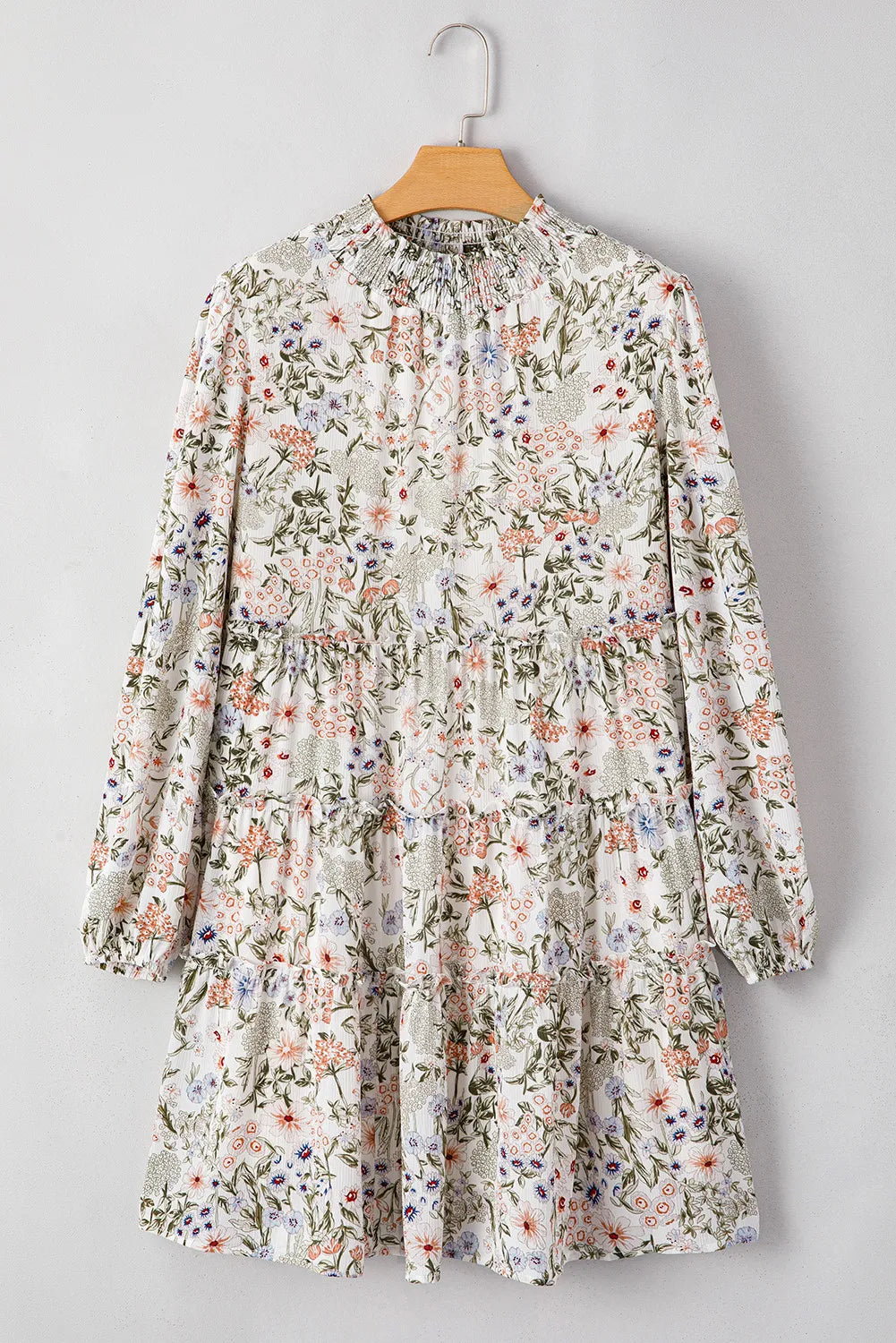 Floral printed mock-neck long-sleeve mini dress by Stevvex, cream with blossoms, tiered hem on Tampa Home & Garden Store