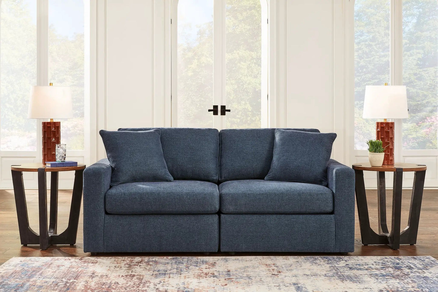Modmax Ink sectional sofa in blue fabric by Unique Piece Furniture with end tables and lamps on Tampa Home & Garden Store